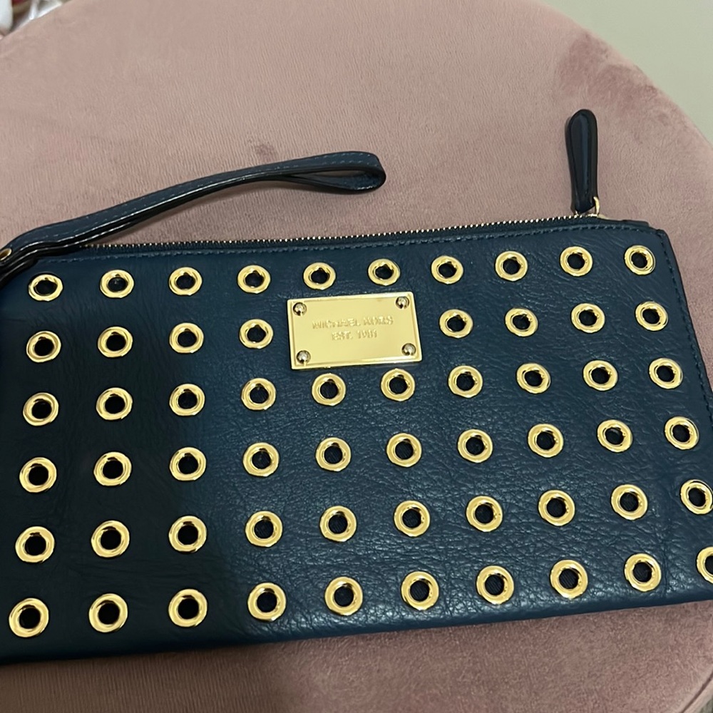Michael Kors navy blue wristlet with gold detail